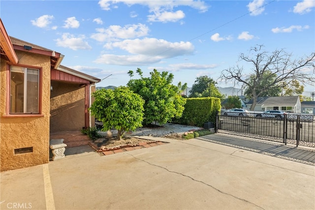 view of patio / terrace featuring fence