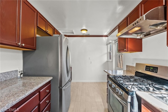 kitchen featuring ornamental molding, reddish brown cabinets, under cabinet range hood, and stainless steel appliances