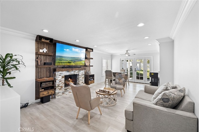 1212 Goldenview Dr, Corona, CA 92882 - living area with ornamental molding, a fireplace, french doors, light wood-style floors, and recessed lighting