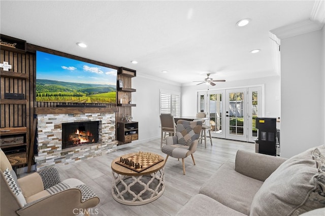 1212 Goldenview Dr, Corona, CA 92882 - living area featuring ornamental molding, wood finished floors, a ceiling fan, a stone fireplace, and recessed lighting