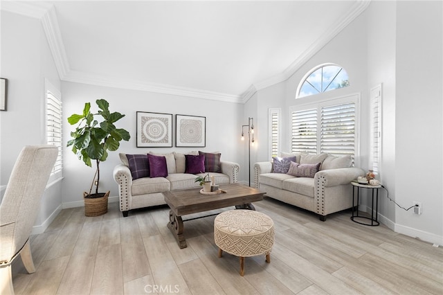 1212 Goldenview Dr, Corona, CA 92882 - living area featuring ornamental molding, light wood-style flooring, baseboards, and high vaulted ceiling