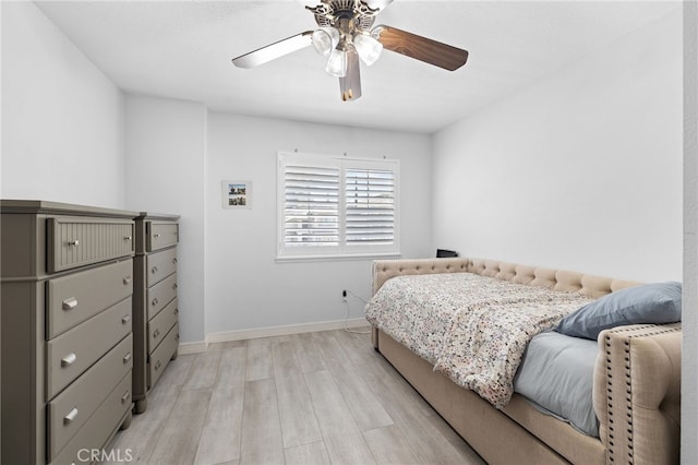 1212 Goldenview Dr, Corona, CA 92882 - bedroom with light wood-style flooring, baseboards, and ceiling fan