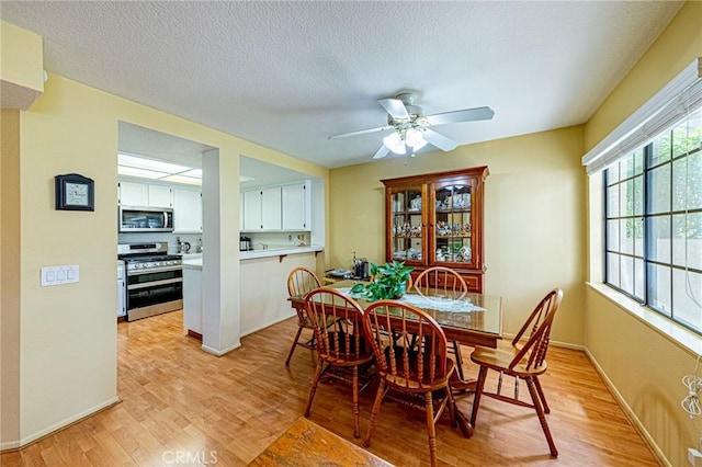 22933 Estoril Dr Unit 1, Diamond Bar, CA 91765 - dining area featuring light wood finished floors, baseboards, and ceiling fan