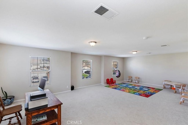 playroom with baseboards, carpet, visible vents, and a wealth of natural light