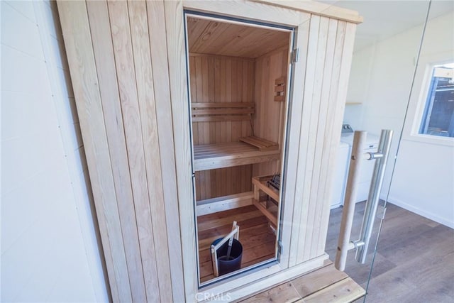 view of sauna with wood finished floors