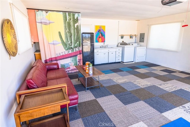 3667 Lucerne Vista Ave, Yucca Valley, CA 92284 - living room with independent washer and dryer and electric panel