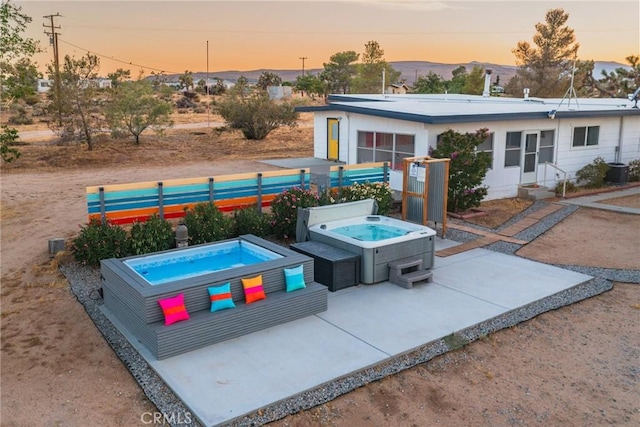 3667 Lucerne Vista Ave, Yucca Valley, CA 92284 - view of pool featuring a hot tub, a patio, and entry steps