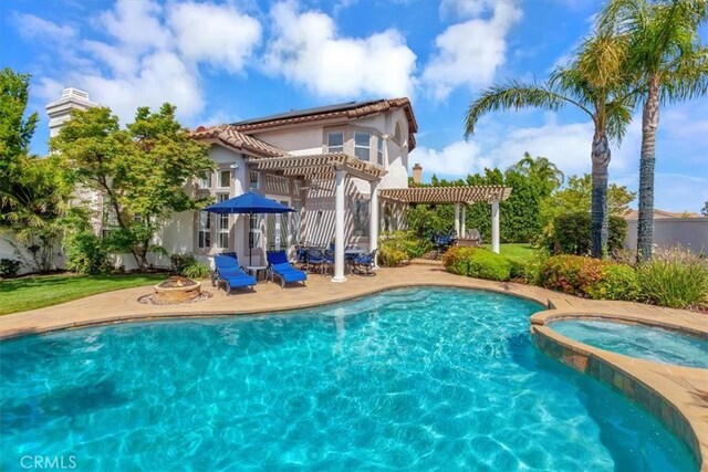 14043 Shepherd Dr, Rancho Cucamonga, CA 91739 - view of swimming pool featuring a pergola, a patio area, an outdoor fire pit, and a pool with connected hot tub