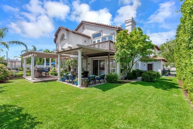 14043 Shepherd Dr, Rancho Cucamonga, CA 91739 - back of property featuring a balcony, a pergola, and a lawn