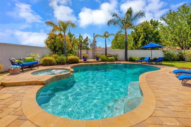 14043 Shepherd Dr, Rancho Cucamonga, CA 91739 - view of swimming pool featuring a fenced backyard, a patio area, and a pool with connected hot tub