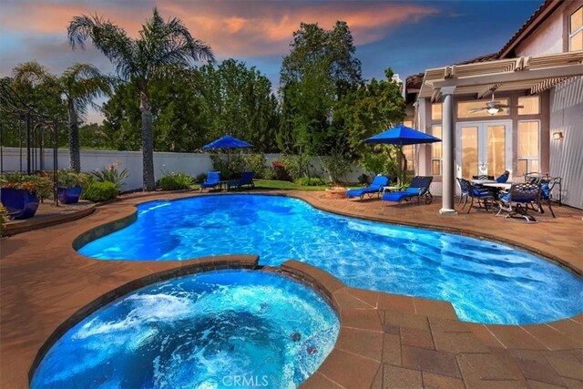 14043 Shepherd Dr, Rancho Cucamonga, CA 91739 - view of swimming pool with a patio area, ceiling fan, and a pool with connected hot tub