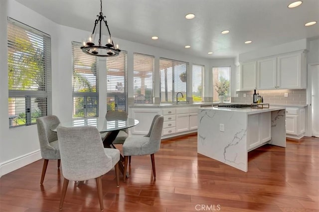 14043 Shepherd Dr, Rancho Cucamonga, CA 91739 - dining area featuring recessed lighting, dark wood-style floors, a chandelier, and baseboards