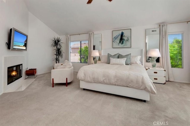 14043 Shepherd Dr, Rancho Cucamonga, CA 91739 - bedroom featuring carpet, lofted ceiling, a fireplace with flush hearth, and a ceiling fan