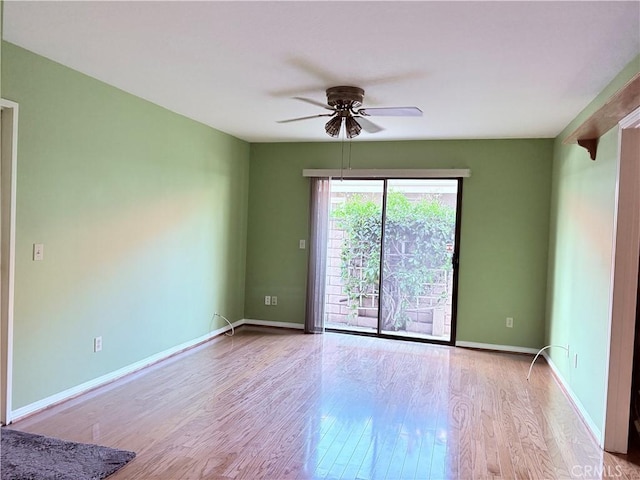 1244 Winged Foot Dr, Upland, CA 91786 - spare room with a ceiling fan, wood finished floors, and baseboards