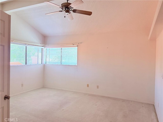 1244 Winged Foot Dr, Upland, CA 91786 - spare room featuring light carpet, ceiling fan, lofted ceiling, baseboards, and a textured ceiling