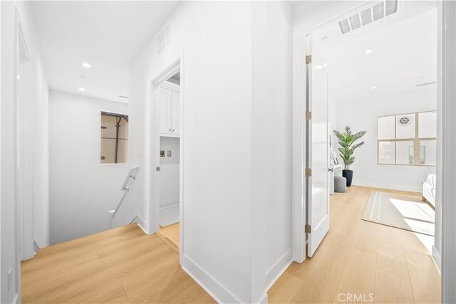 312 Carefree, Irvine, CA 92618 - corridor featuring visible vents, light wood-style flooring, an upstairs landing, and recessed lighting