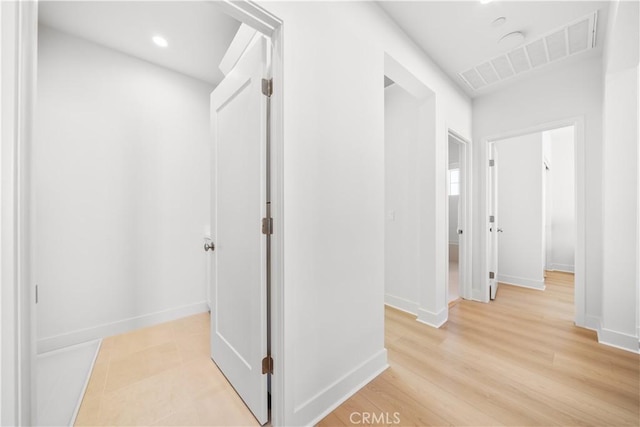312 Carefree, Irvine, CA 92618 - hall with recessed lighting, visible vents, baseboards, and light wood-style flooring