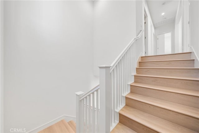312 Carefree, Irvine, CA 92618 - stairs with baseboards and wood finished floors