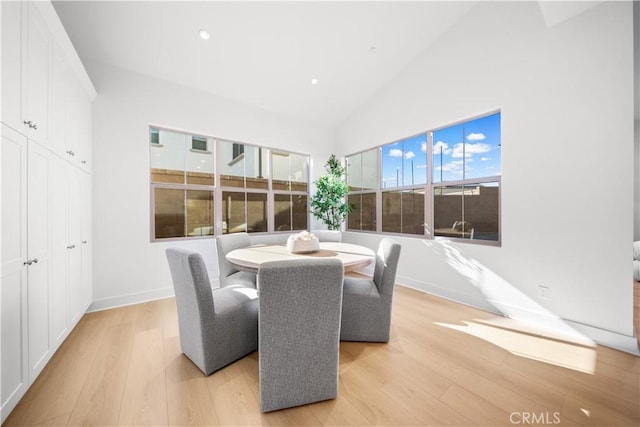 312 Carefree, Irvine, CA 92618 - dining room featuring light wood-type flooring, high vaulted ceiling, baseboards, and recessed lighting