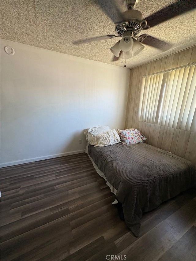 3670 Upper Terrace Dr, Riverside, CA 92505 - bedroom featuring wood finished floors, a textured ceiling, baseboards, and ceiling fan