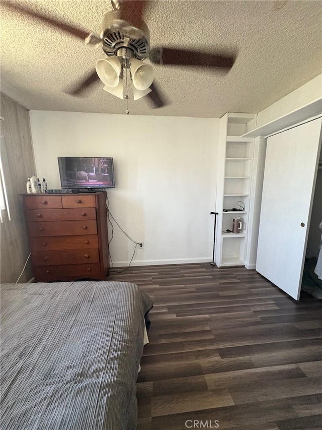 3670 Upper Terrace Dr, Riverside, CA 92505 - bedroom featuring wood finished floors, a textured ceiling, a ceiling fan, and baseboards