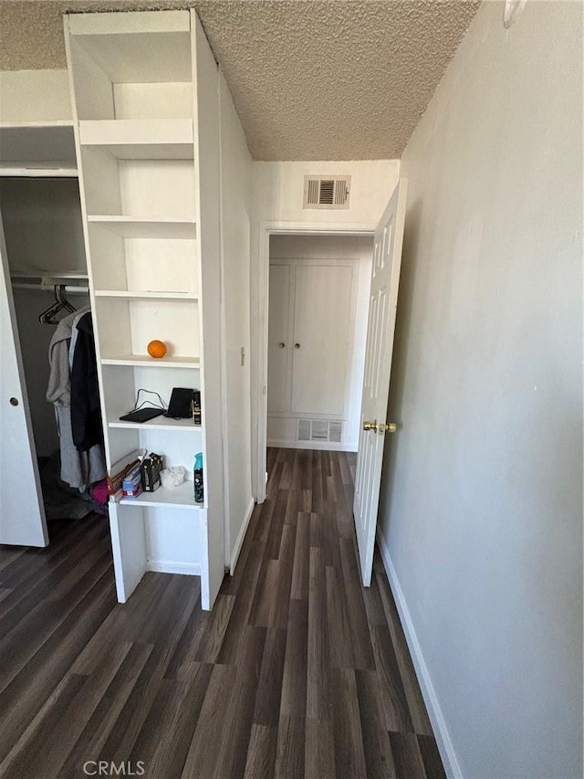 3670 Upper Terrace Dr, Riverside, CA 92505 - hall with wood finished floors, a textured ceiling, and baseboards
