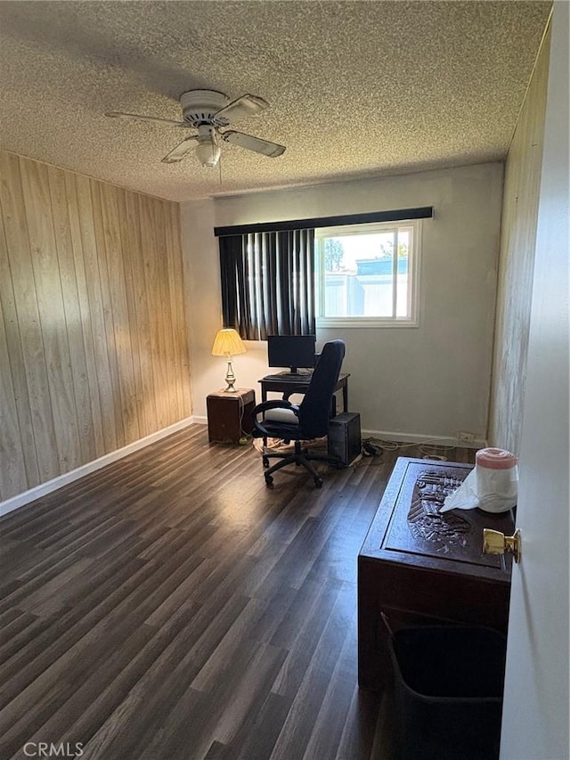 3670 Upper Terrace Dr, Riverside, CA 92505 - office area featuring wood walls, ceiling fan, baseboards, wood finished floors, and a textured ceiling