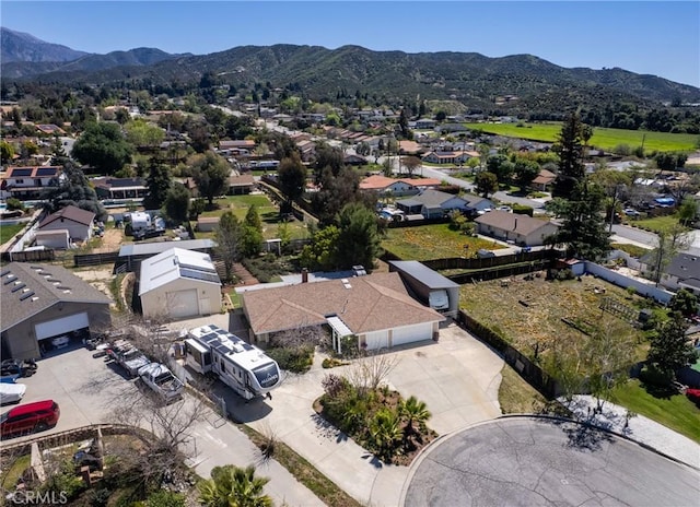 bird's eye view with a mountain view and a residential view
