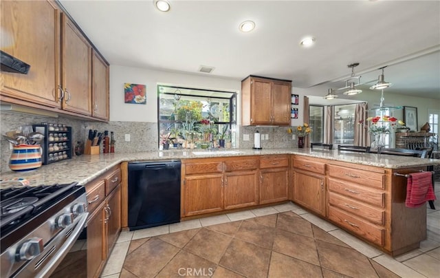kitchen featuring light tile patterned floors, black dishwasher, gas range, a sink, and brown cabinets