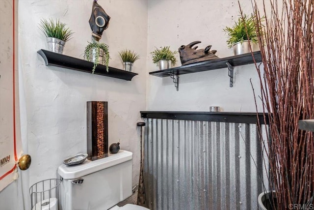 bathroom featuring toilet