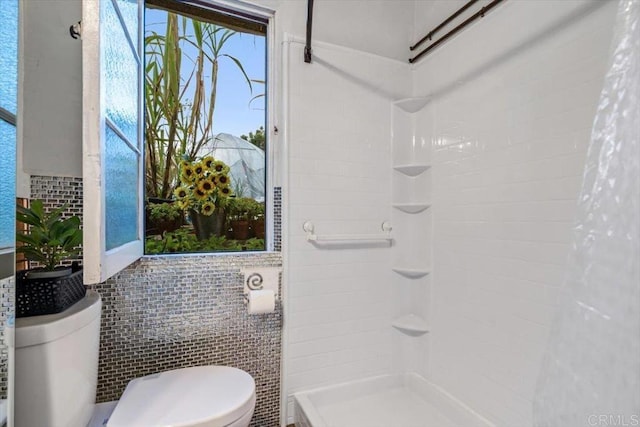 4210 Black Mountain Rd, La Mesa, CA 91941 - bathroom featuring tiled shower and tile walls