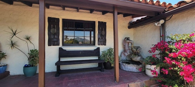4210 Black Mountain Rd, La Mesa, CA 91941 - view of exterior entry with stucco siding and covered porch