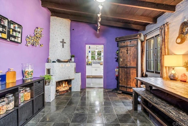 4210 Black Mountain Rd, La Mesa, CA 91941 - entrance foyer featuring a wooden ceiling with exposed beams, a large fireplace, and high vaulted ceiling