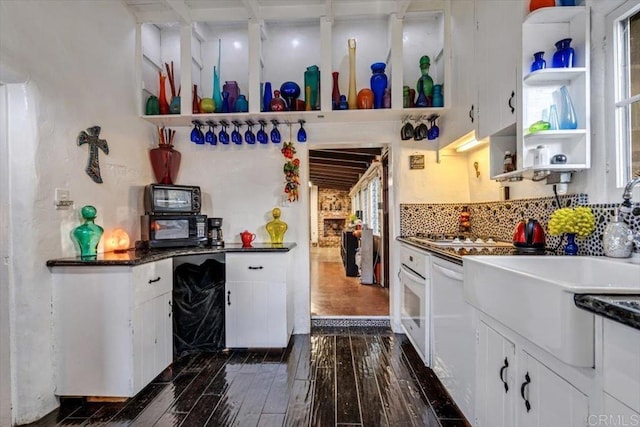 4210 Black Mountain Rd, La Mesa, CA 91941 - kitchen featuring open shelves, dark wood-style flooring, white cabinetry, and decorative backsplash