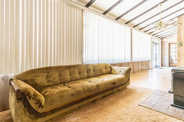 7040 Kenyon Ave, Hesperia, CA 92345 - living area featuring wood finished floors and vaulted ceiling