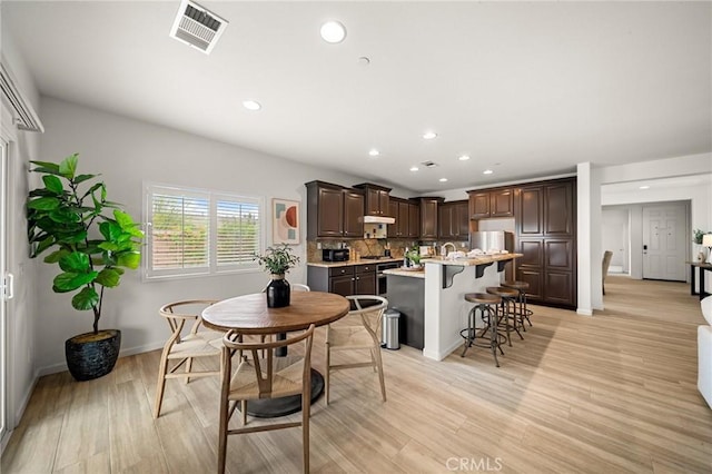 73992 Van Gogh Dr, Palm Desert, CA 92211 - dining space with recessed lighting, light wood-type flooring, and baseboards