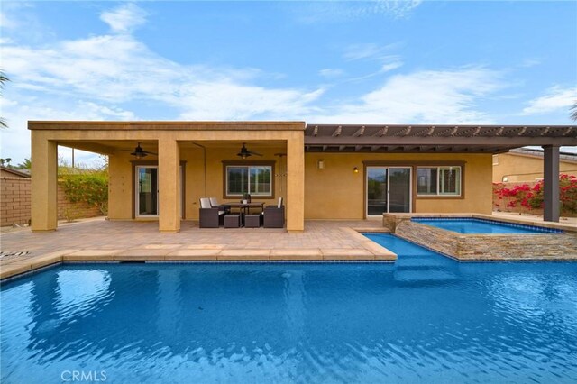 73992 Van Gogh Dr, Palm Desert, CA 92211 - rear view of house featuring an in-ground hot tub, ceiling fan, an outdoor pool, stucco siding, and a patio