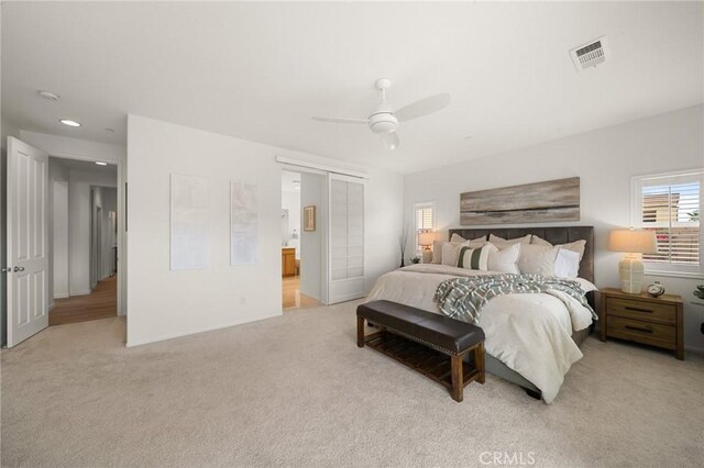 73992 Van Gogh Dr, Palm Desert, CA 92211 - bedroom featuring light colored carpet, connected bathroom, a ceiling fan, and recessed lighting