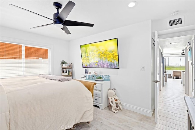 bedroom with light wood-type flooring, baseboards, recessed lighting, visible vents, and ceiling fan