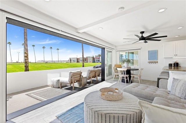 916 E Oceanfront, Newport Beach, CA 92661 - living area featuring wood finished floors, ceiling fan, recessed lighting, and beam ceiling