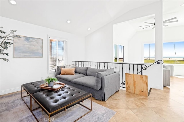 living area featuring recessed lighting, a wealth of natural light, a ceiling fan, and vaulted ceiling