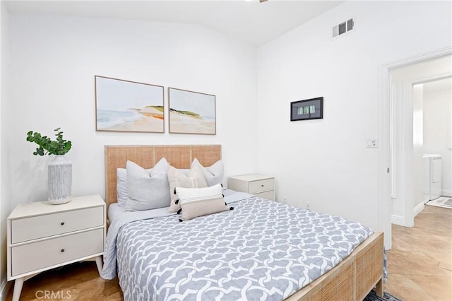 916 E Oceanfront, Newport Beach, CA 92661 - bedroom featuring vaulted ceiling and light tile patterned flooring