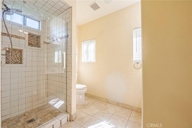 2550 5th Ave, Merced, CA 95340 - bathroom with a stall shower, healthy amount of natural light, and tile patterned flooring