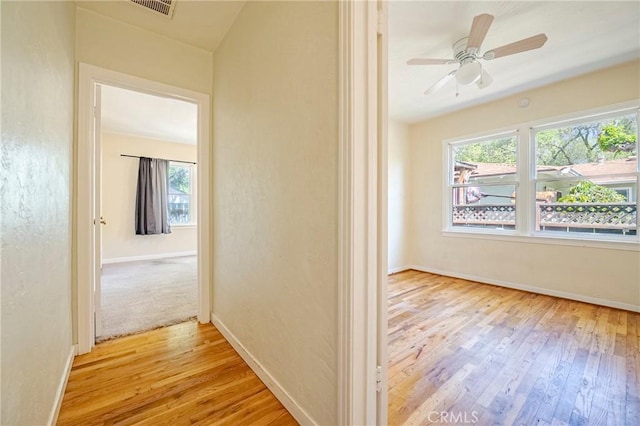 2550 5th Ave, Merced, CA 95340 - hall with hardwood / wood-style flooring and baseboards