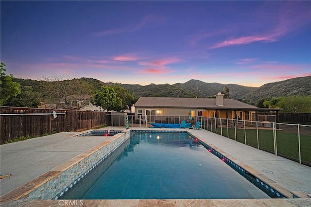 20536 Black Walnut Ct, Wildomar, CA 92595 - view of swimming pool featuring a mountain view, a patio area, and a pool with connected hot tub