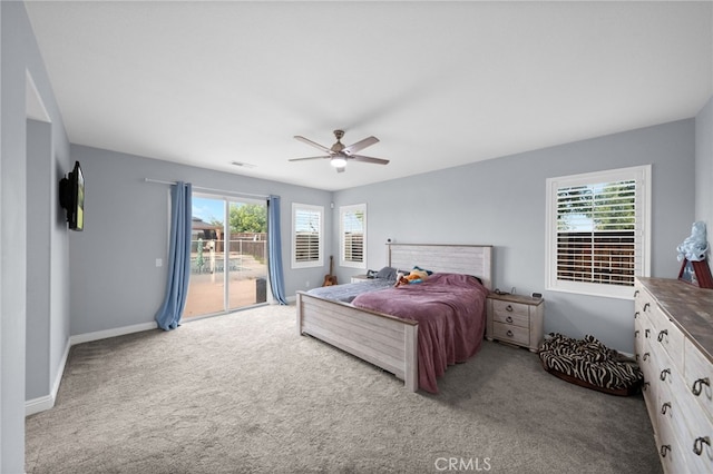 bedroom featuring visible vents, a ceiling fan, access to exterior, baseboards, and carpet flooring