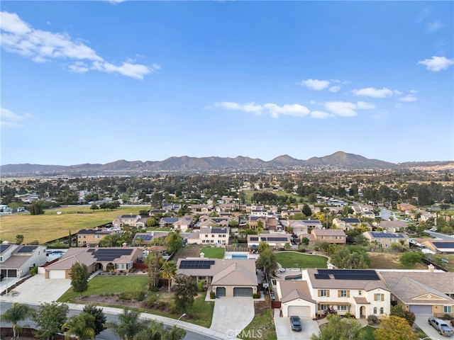 drone / aerial view with a residential view and a mountain view
