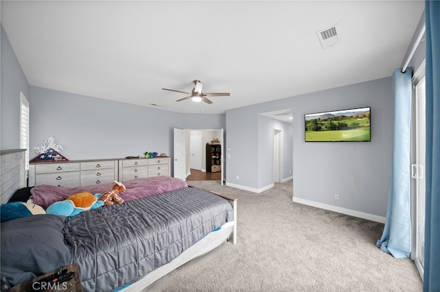 bedroom with visible vents, baseboards, carpet floors, and multiple windows
