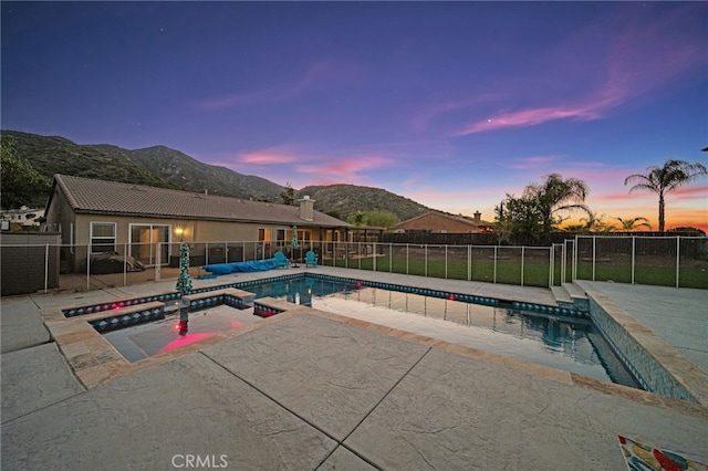 20536 Black Walnut Ct, Wildomar, CA 92595 - view of pool featuring an in-ground hot tub, a fenced backyard, a patio area, and a mountain view