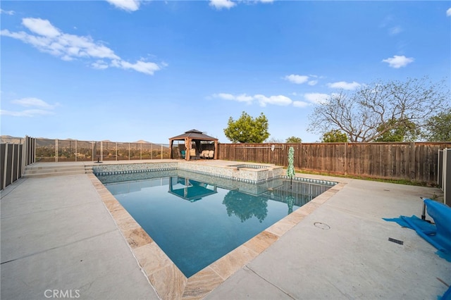 view of pool featuring a gazebo, an in ground hot tub, a fenced in pool, and a patio